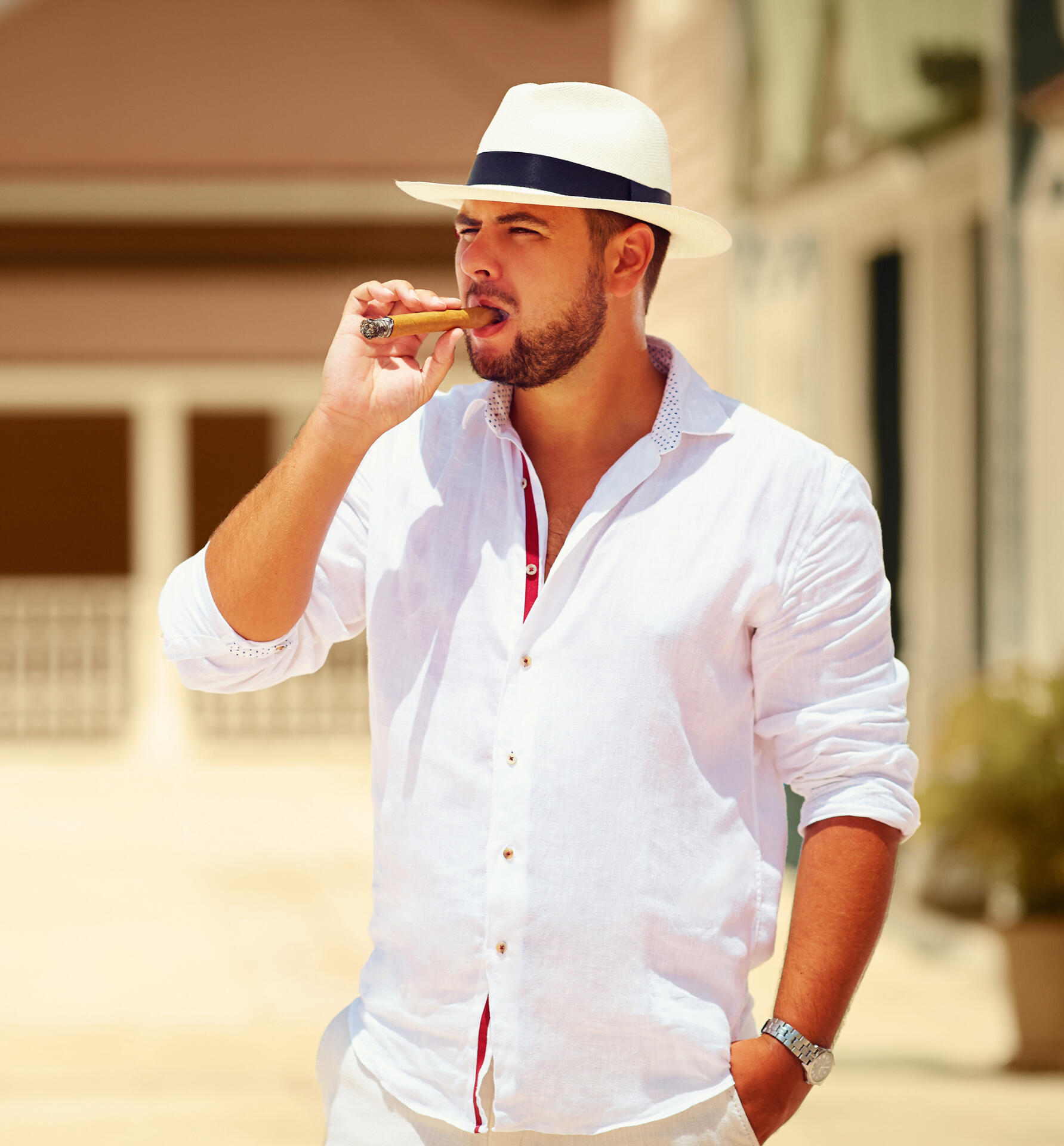 Connoisseur smoking a cigar in the Caribbean
